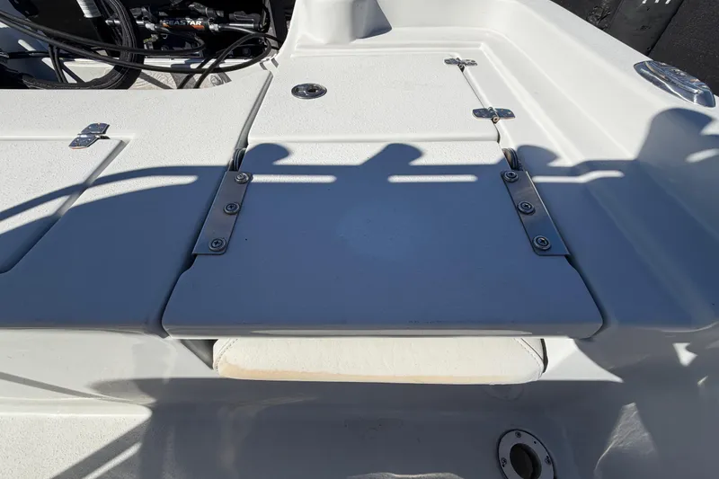 Slide: The Image of 2020 Blazer Bay 2200 Fisherman boat deck with storage compartments and hinges. - 60