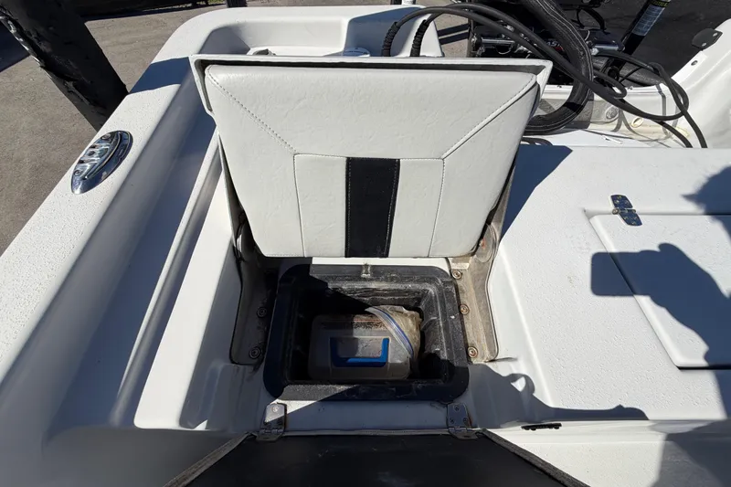 Slide: The Image of 2020 Blazer Bay 2200 Fisherman boat seat with storage compartment open. - 57