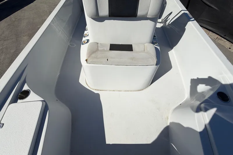 Slide: The Image of 2020 Blazer Bay 2200 Fisherman boat interior with seating and storage compartments. - 48