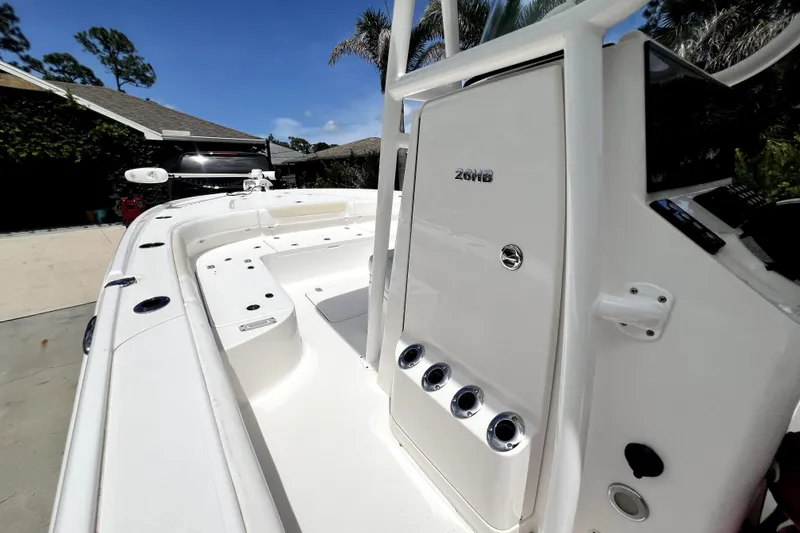 Slide: The Image of 2020 Caymas 26 HB boat interior with sleek white design and modern features. - 68