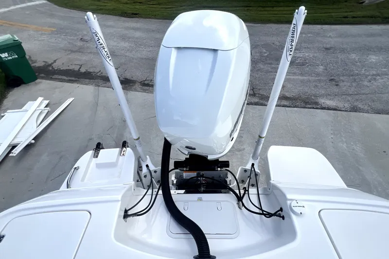 Slide: The Image of 2020 Caymas 26 HB boat with dual Power-Pole anchors, viewed from above. - 74