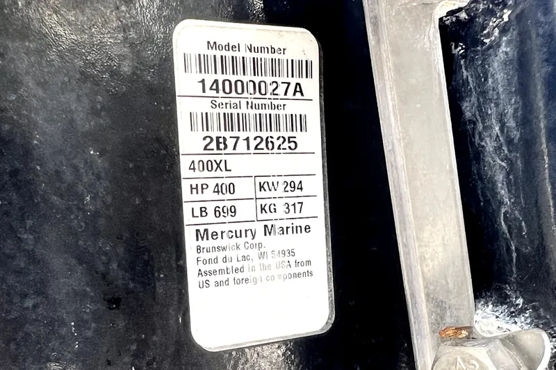 Slide: The Image of Label on a 2020 Caymas 26 HB boat with Mercury Marine specifications. - 20