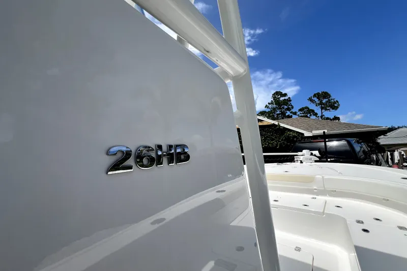 Slide: The Image of 2020 Caymas 26 HB boat with clear sky background. - 72