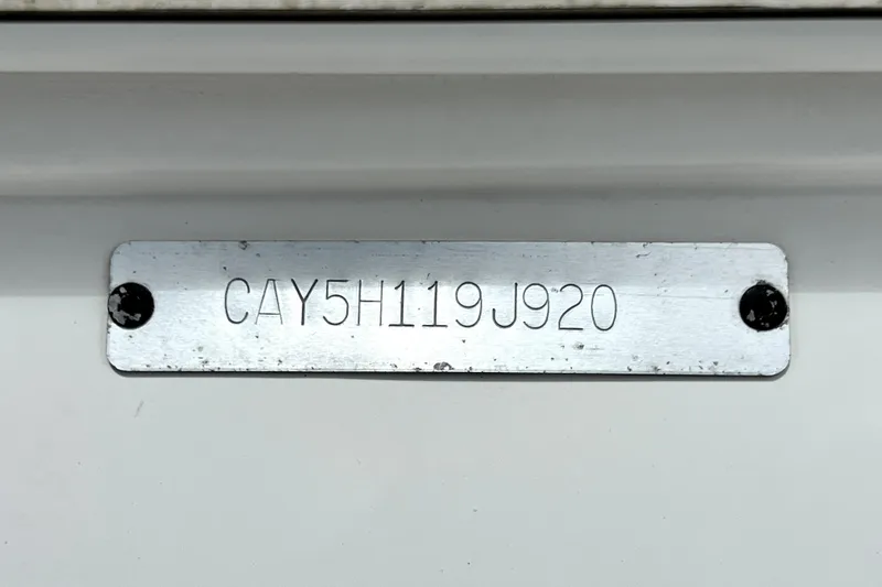 Slide: The Image of 2020 Caymas 26 HB boat identification plate with serial number CAY5H119J920. - 19
