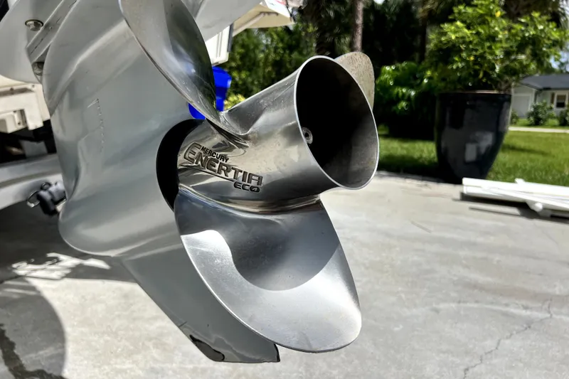 Slide: The Image of Close-up of Mercury Enertia Eco propeller on 2020 Caymas 26 HB boat. - 13