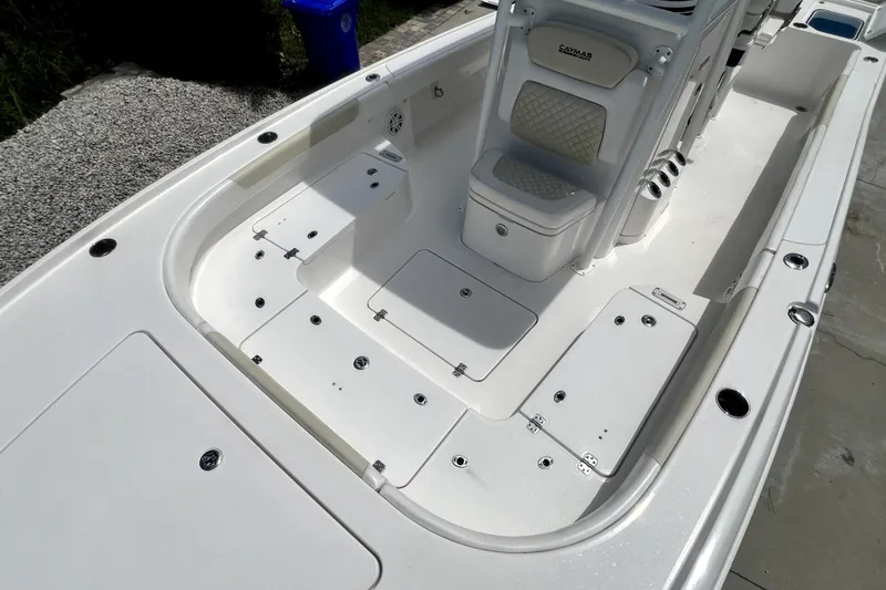 Slide: The Image of 2020 Caymas 26 HB boat interior with seating and storage compartments. - 56