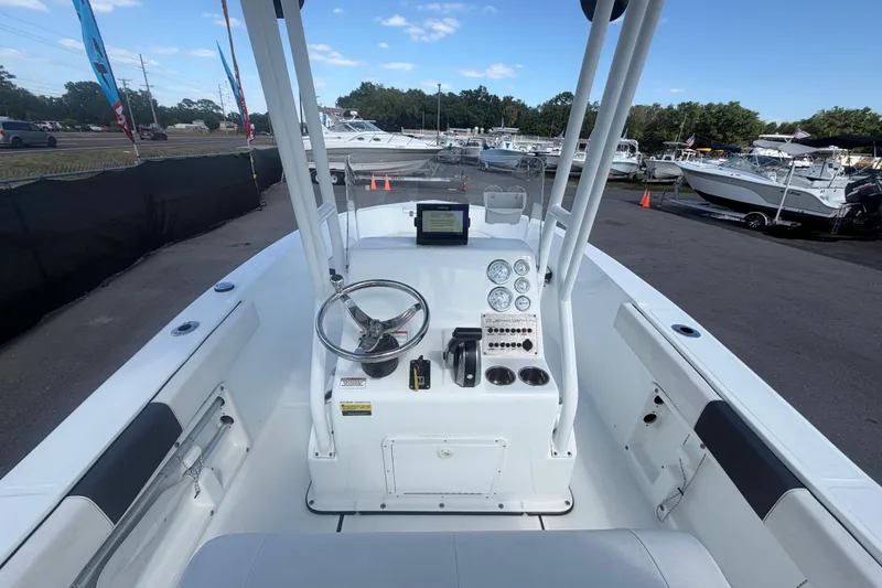Slide: The Image of 2020 Clearwater 2000 Center Console boat interior with steering wheel and control panel. - 31