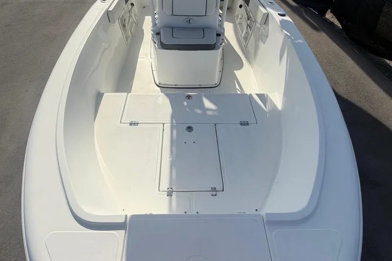 Slide: The Image of 2020 Clearwater 2000 Center Console boat interior, featuring spacious deck and seating. - 63