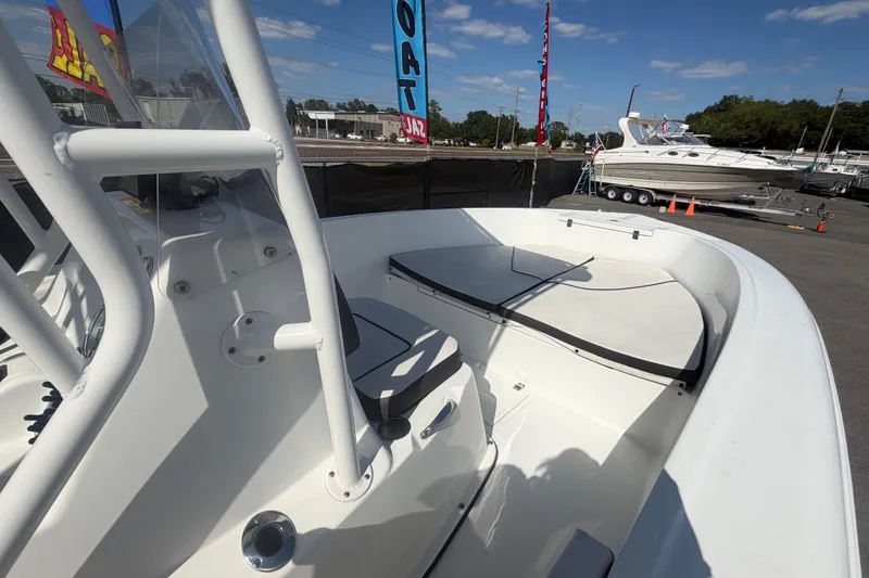 Slide: The Image of 2020 Clearwater 2000 Center Console boat interior with seating, displayed outdoors. - 47
