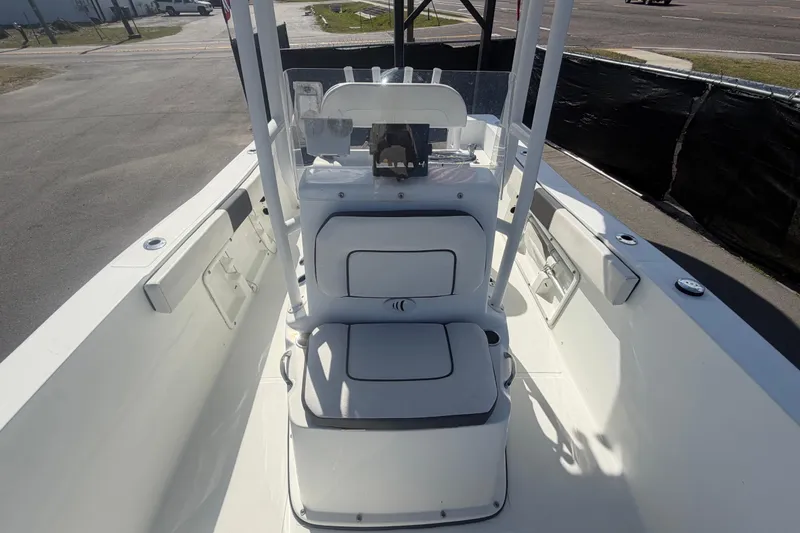 Slide: The Image of 2020 Clearwater 2000 Center Console boat interior with seating and console view. - 70