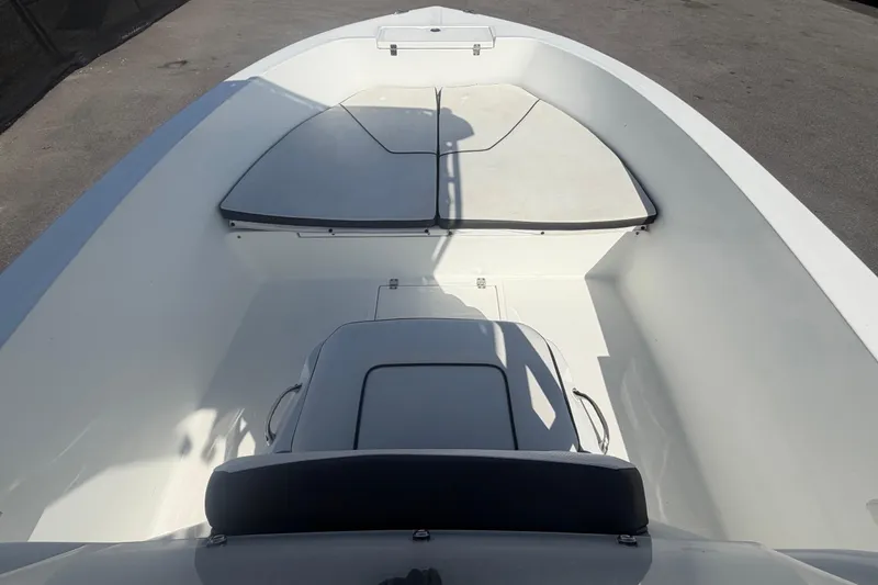 Slide: The Image of 2020 Clearwater 2000 Center Console boat interior with seating and storage compartments. - 49