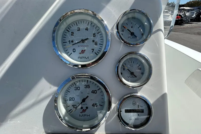 Slide: The Image of Clearwater 2000 Center Console 2020 dashboard with RPM, fuel, volt, and hour gauges. - 38