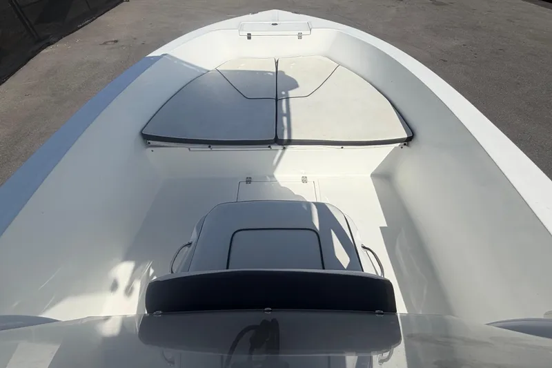 Slide: The Image of 2020 Clearwater 2000 Center Console boat interior, featuring spacious seating and storage areas. - 48