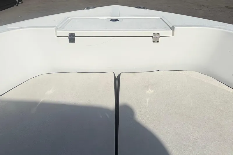 Slide: The Image of 2020 Clearwater 2000 Center Console boat interior with storage compartment. - 59