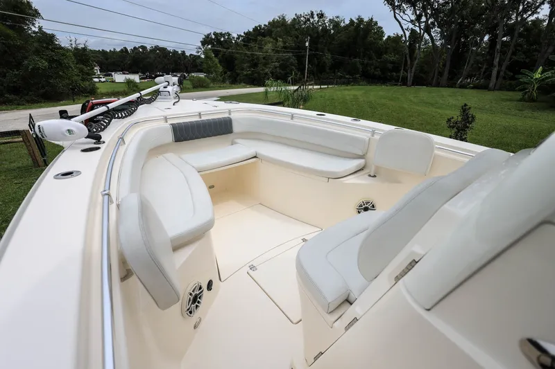 Slide: The Image of 2020 Cobia 301 Center Console boat with spacious seating and sleek design. - 20