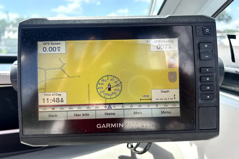 Slide: The Image of Garmin GPS display on 2020 Four Winns HD220 boat, showing navigation details. - 20
