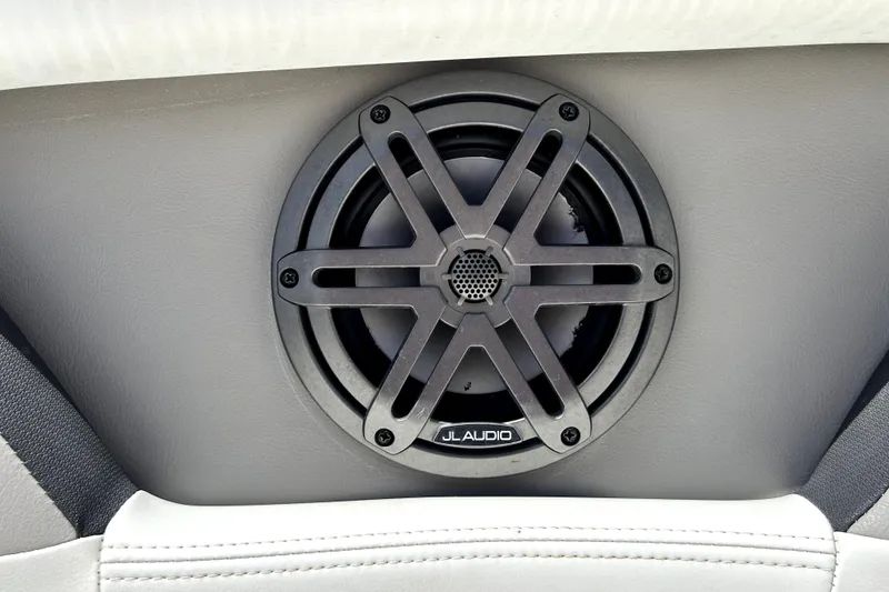 Slide: The Image of Speaker on 2020 Four Winns HD220 boat, featuring JL Audio branding. - 63