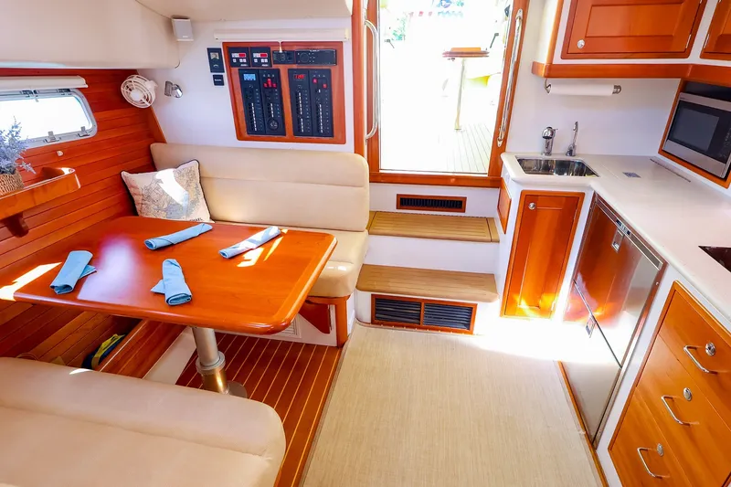 Slide: The Image of Interior of 2017 MJM 40z Downeast yacht with elegant dining and kitchen area. - 29