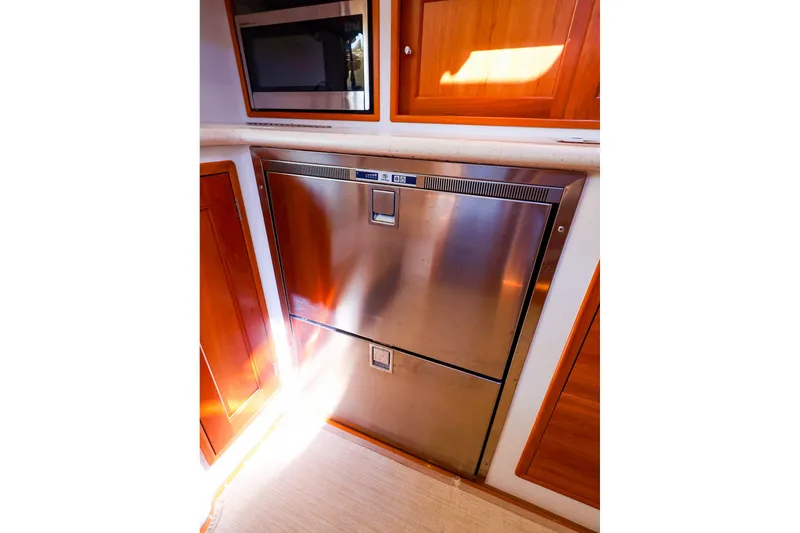 Slide: The Image of Stainless steel refrigerator and microwave in 2017 MJM 40z Downeast yacht kitchen. - 33