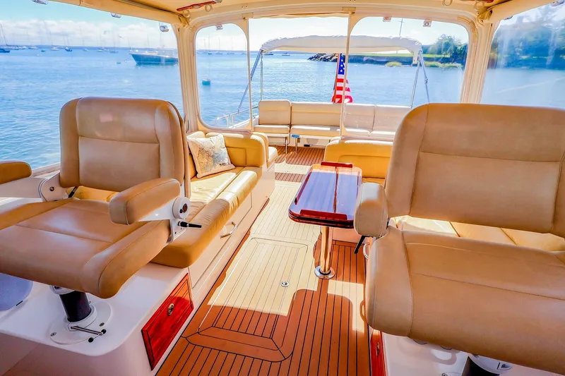 Slide: The Image of Luxurious interior of 2017 MJM 40z Downeast yacht with leather seating and scenic ocean view. - 19