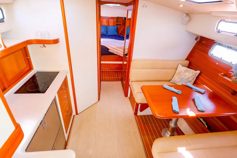 Slide: The Image of Luxurious interior of 2017 MJM 40z Downeast yacht with cozy dining and kitchen area. - 28