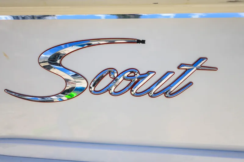 Slide: The Image of Gros plan sur le logo "Scout" sur un bateau. - 31