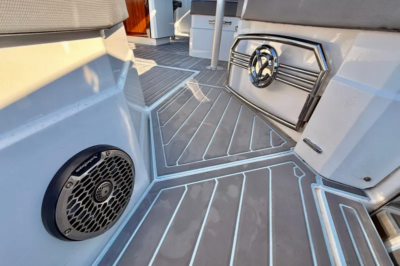 Slide: The Image of 2022 New Cruiser Yachts GLS 38 interior with sleek flooring and speaker detail. - 65