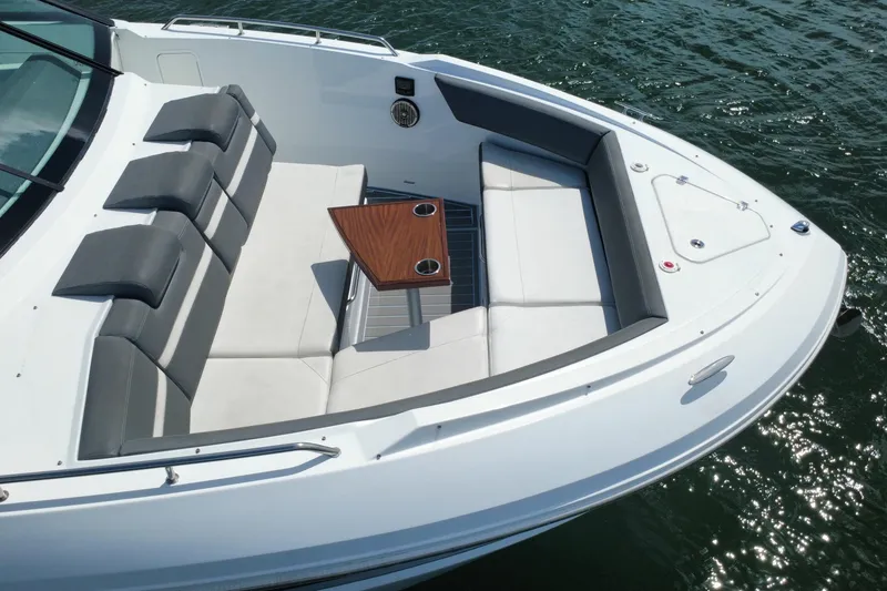 Slide: The Image of Luxurious 2022 New Cruiser Yachts GLS 38 boat with elegant seating and table on water. - 13