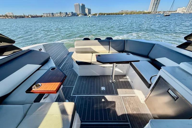 Slide: The Image of Luxurious 2022 New Cruiser Yachts GLS 38 with spacious seating and scenic waterfront view. - 58