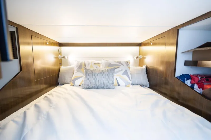 Slide: The Image of Luxurious cabin interior of 2022 New Cruiser Yachts GLS 38 with cozy bedding. - 40