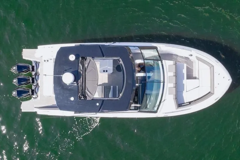 Slide: The Image of Aerial view of 2022 New Cruiser Yachts GLS 38 on open water. - 17