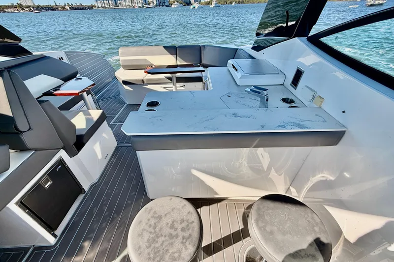 Slide: The Image of Luxury interior of 2022 New Cruiser Yachts GLS 38 with seating and kitchenette. - 49