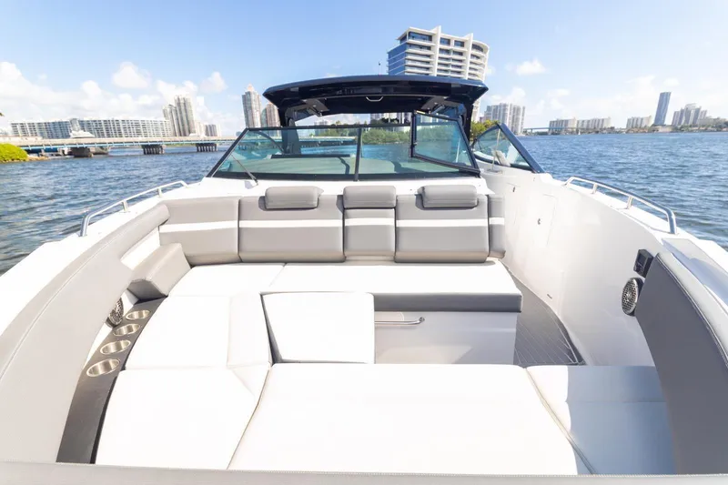 Slide: The Image of 2022 New Cruiser Yachts GLS 38, luxury boat interior with waterfront cityscape. - 56