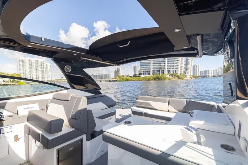 Slide: The Image of 2022 New Cruiser Yachts GLS 38 interior with cityscape and water view. - 51
