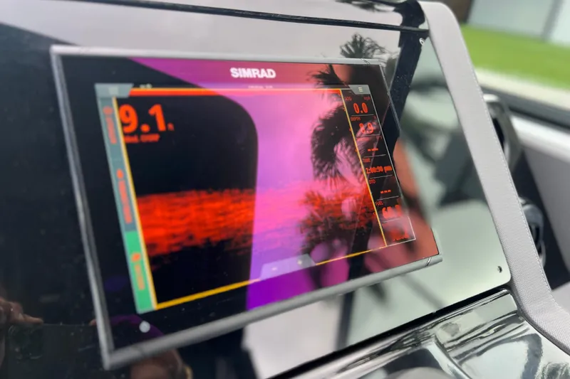 Slide: The Image of Simrad display on 2022 New Cruiser Yachts GLS 38, showing navigation data. - 28