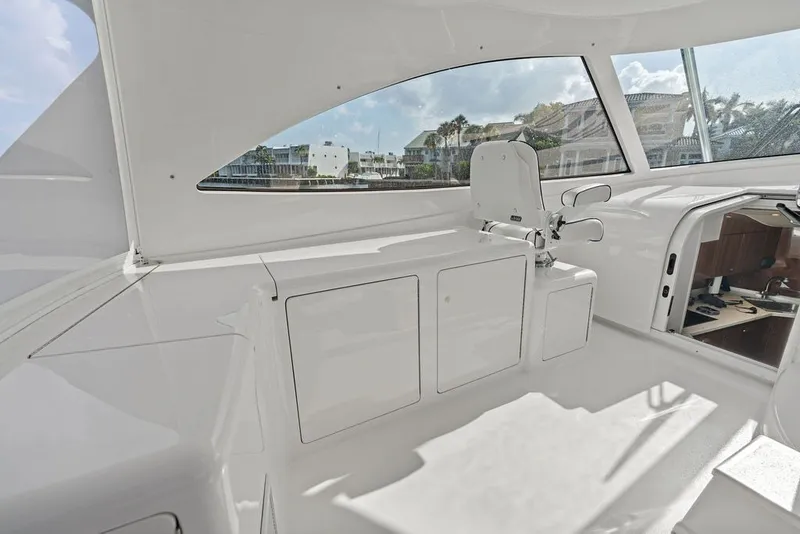 Slide: The Image of Interior view of 2021 Viking 52 Sport Tower yacht, showcasing sleek design and modern amenities. - 45