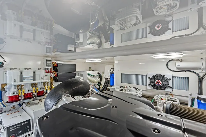 Slide: The Image of Engine room of 2021 Viking 52 Sport Tower, showcasing advanced machinery and equipment. - 69