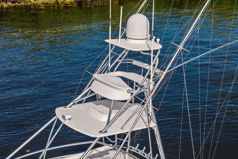 Slide: The Image of 2021 Viking 52 Sport Tower's tower structure over calm water. - 22