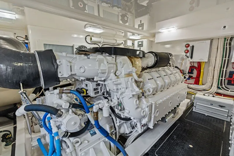 Slide: The Image of Engine room of 2021 Viking 52 Sport Tower with advanced machinery and wiring. - 65