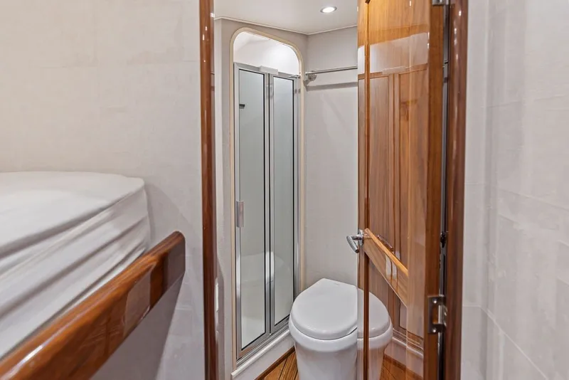 Slide: The Image of Luxurious bathroom interior of 2021 Viking 52 Sport Tower yacht. - 60