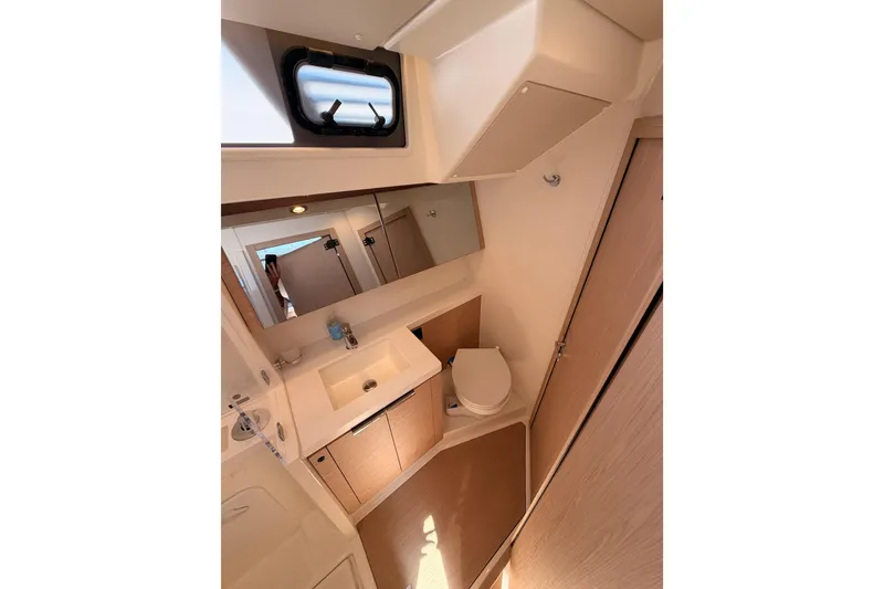Slide: The Image of Modern bathroom interior of 2022 Beneteau Oceanis Yacht 54, featuring sleek design and fixtures. - 62