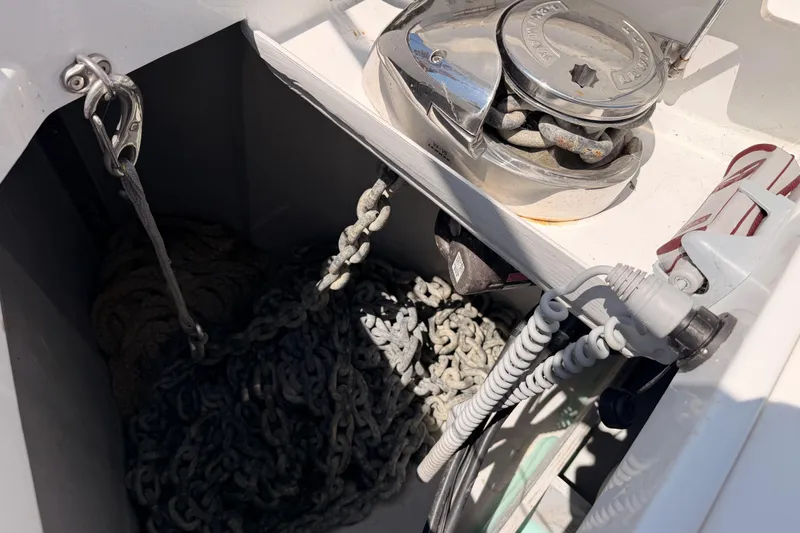 Slide: The Image of Anchor chain and windlass on a 2022 Beneteau Oceanis Yacht 54. - 23