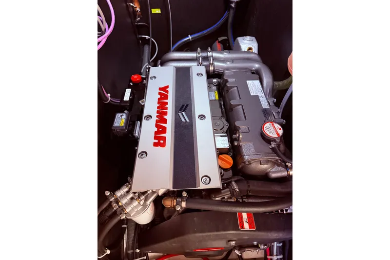 Slide: The Image of Yanmar engine in 2022 Beneteau Oceanis Yacht 54, showcasing detailed components. - 98