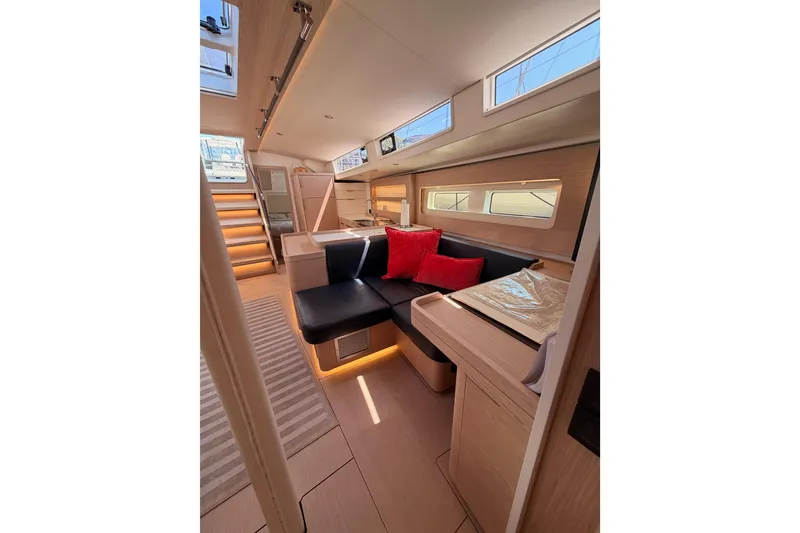 Slide: The Image of Luxurious interior of 2022 Beneteau Oceanis Yacht 54 with modern seating and elegant design. - 87