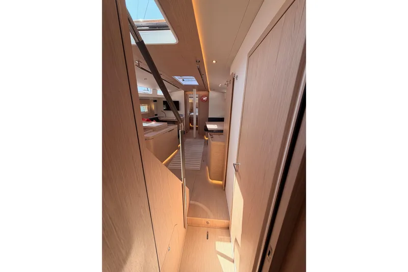 Slide: The Image of Interior of 2022 Beneteau Oceanis Yacht 54, featuring modern design and natural lighting. - 67