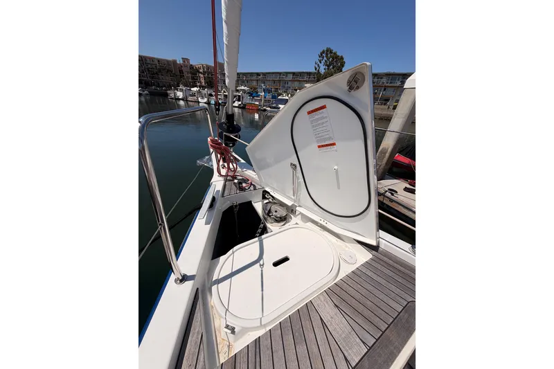 Slide: The Image of Open hatch on 2022 Beneteau Oceanis Yacht 54, docked in marina. - 21