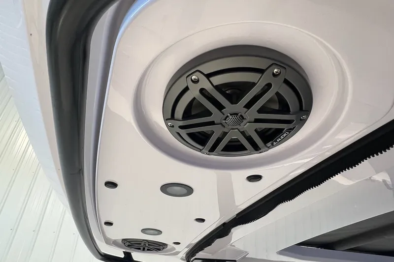 Slide: The Image of Speaker system on 2027 Axopar 29 Sun-Top boat, featuring sleek design and modern technology. - 22