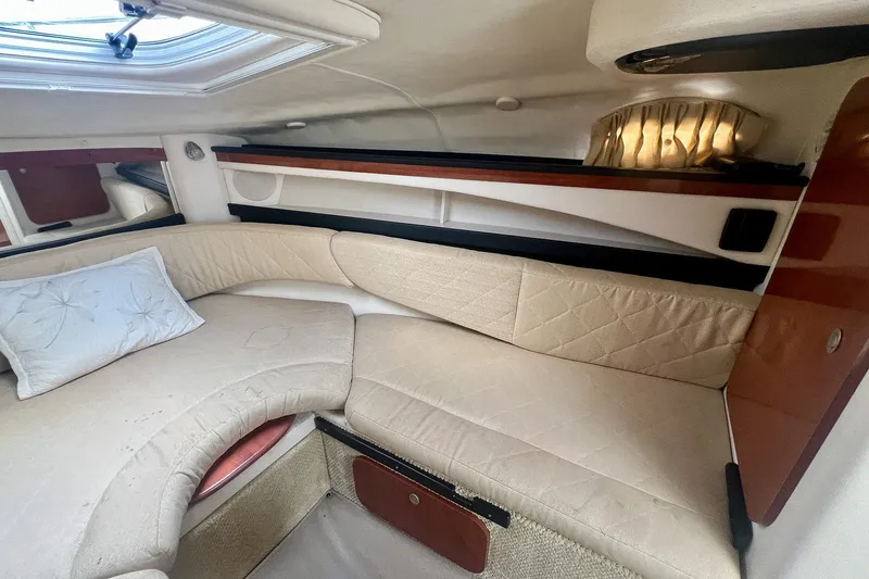 Slide: The Image of Interior of 2007 Sea Ray 270 Amberjack boat with cozy seating and elegant design. - 27