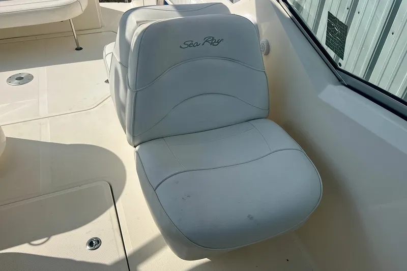 Slide: The Image of White seat on 2007 Sea Ray 270 Amberjack boat, featuring sleek design and comfortable upholstery. - 18