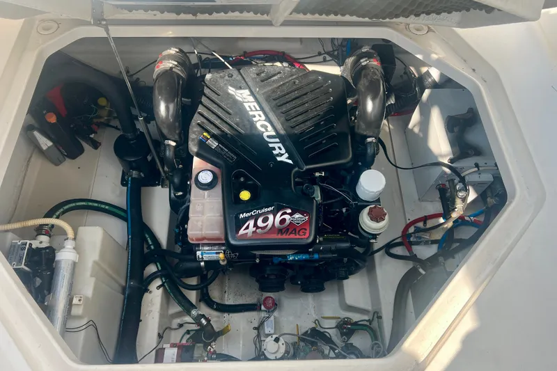 Slide: The Image of Engine compartment of a 2007 Sea Ray 270 Amberjack with a Mercury 496 MAG engine. - 42